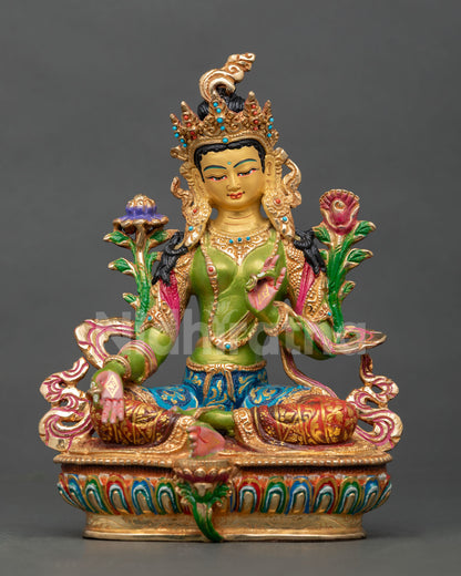 front view of green tara maa figurine with lotus seat and hand-painted acrylic details