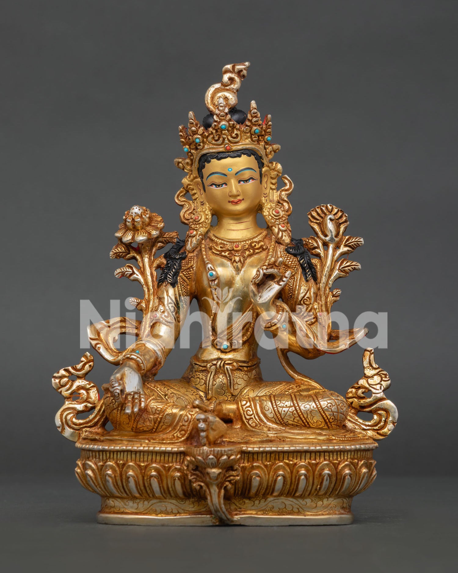 Front view of Green Tara statue, handcrafted in copper with 24K gold gilding and gold painted face from Nepal