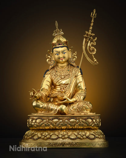 Front view of Guru Rinpoche Padmasambhava statue, 24K gold gilded Vajrayana Buddhist sculpture from Nepal