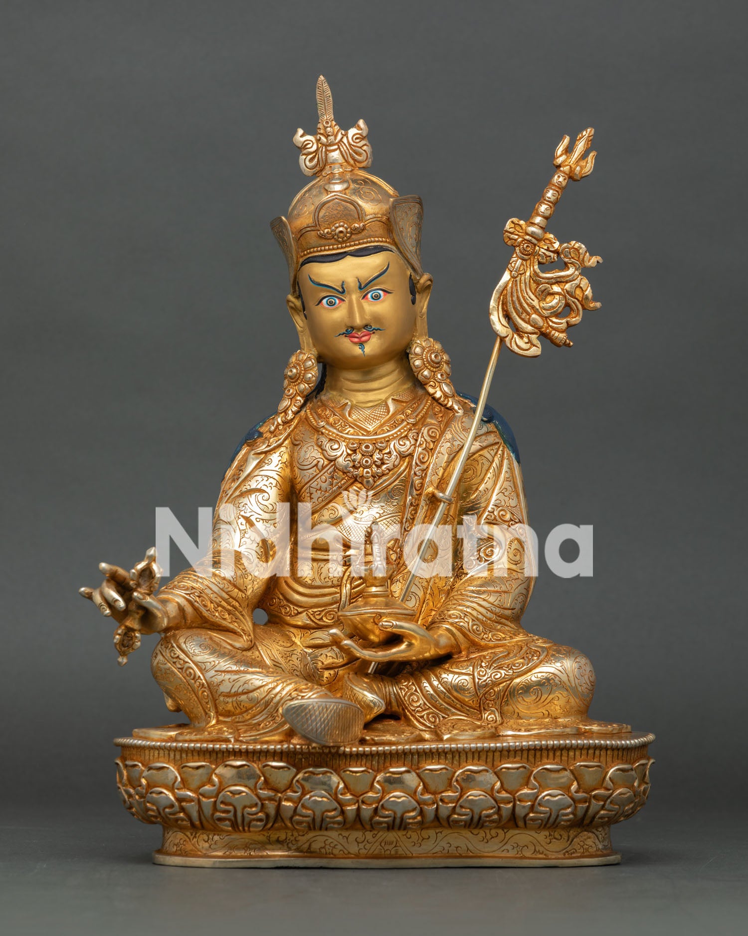 Front view of Guru Rinpoche statue, handcrafted in copper with 24K gold fire gilding and gold painted face from Nepal
