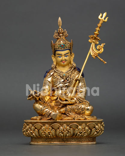 Front view of Guru Rinpoche Statue handcrafted in Nepal with 24K gold gilding, gold-painted face, and sacred Buddhist details.