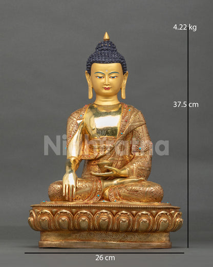 Front view of handcrafted 24K gold Shakyamuni Buddha meditation statue seated on a lotus base.