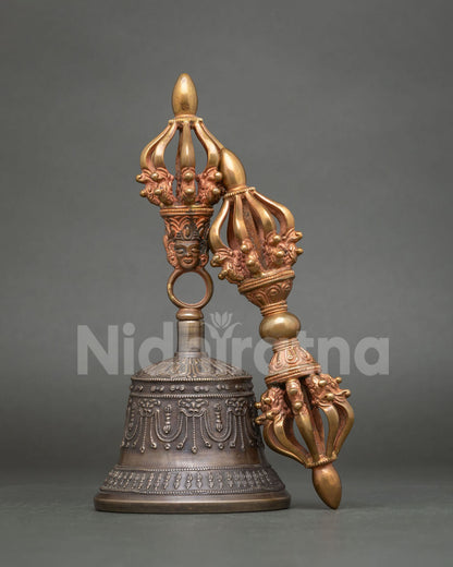 Front view of handcrafted Buddhist Vajra and Bell Set with bronze bell and copper Dorje from Nepal