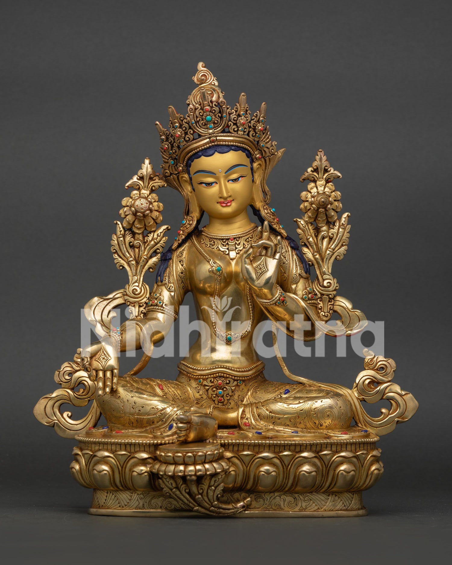 Front view of handcrafted Green Tara Statue with 24K gold gilding from Nepal