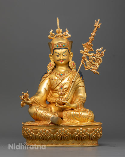 Front view of handcrafted Guru Rinpoche Statue with 24K gold fire gilding and gold painted face