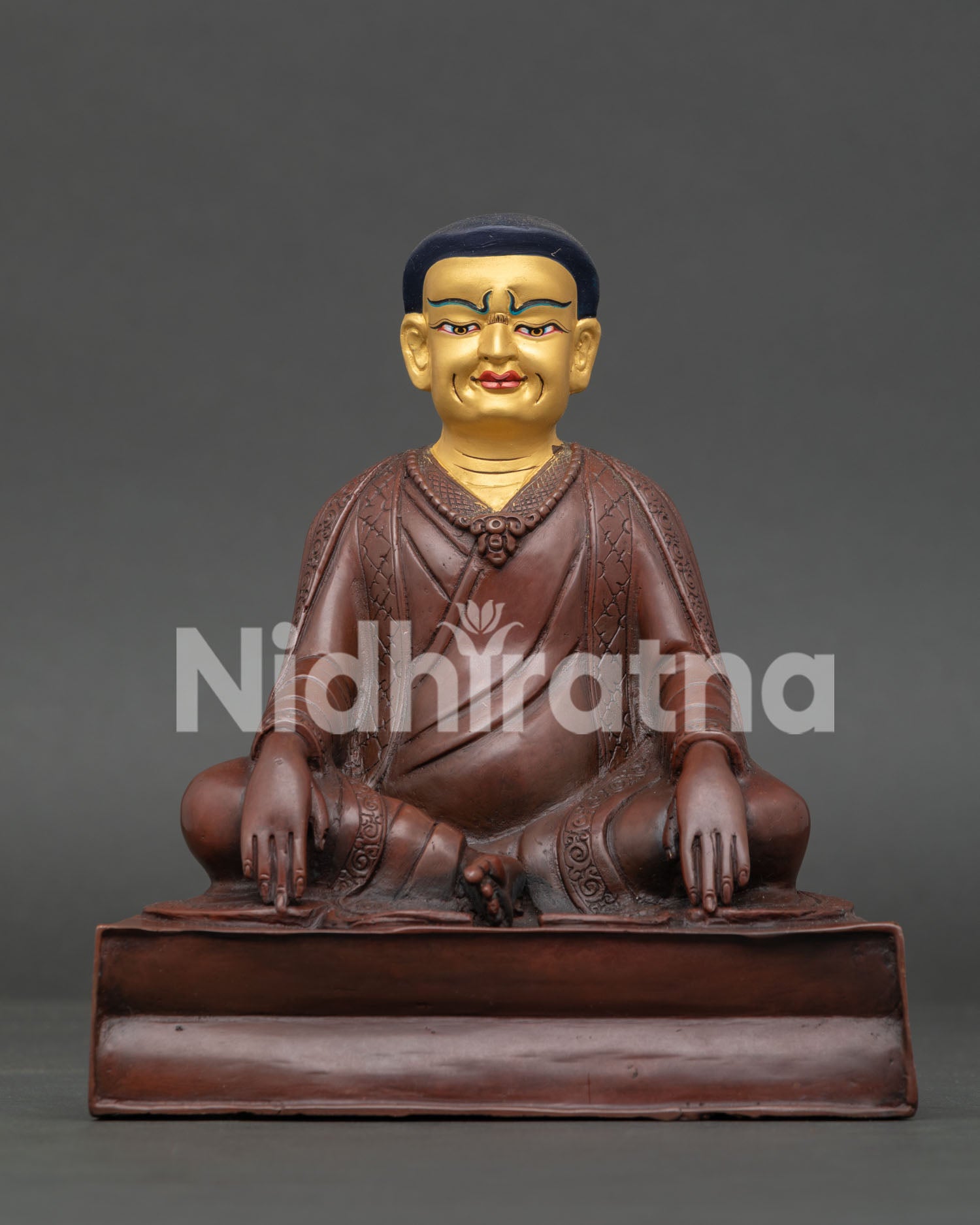 Front View of Handcrafted Marpa Statue in Oxidized Copper with 24K Gold Painted Face