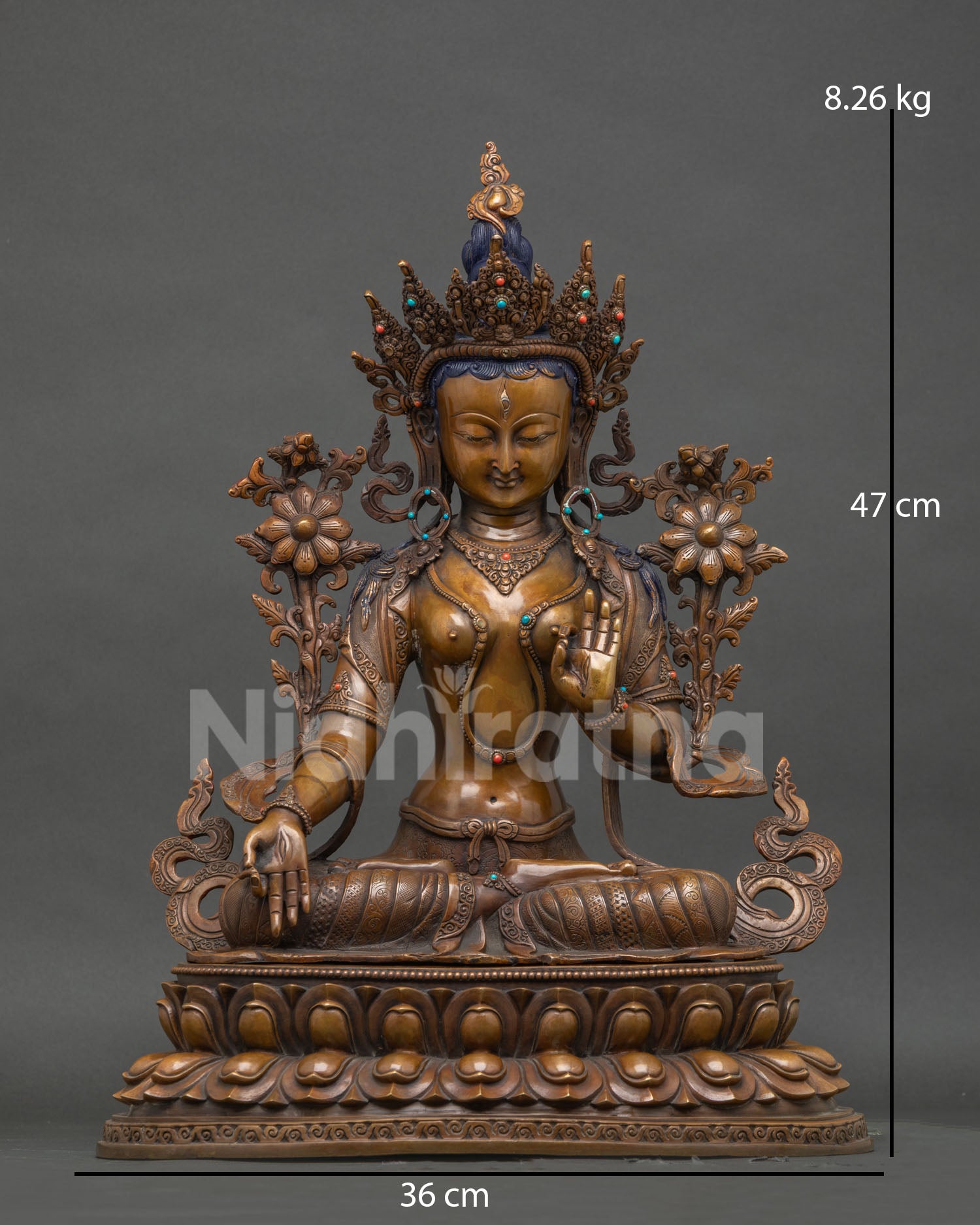 Front view of handcrafted oxidized copper White Tara Buddhist statue, Nepali craftsmanship
