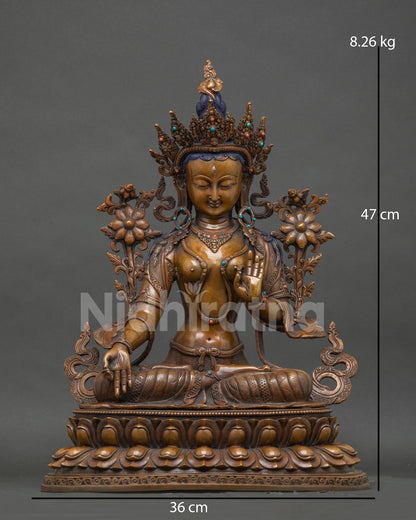Front view of handcrafted oxidized copper White Tara Buddhist statue, Nepali craftsmanship