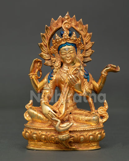 Front view of handcrafted Saraswati statue in copper with gold plated finish and veena symbol of wisdom and knowledge