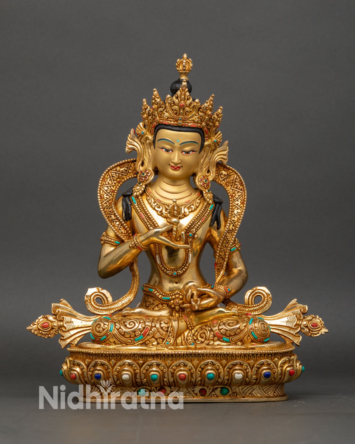 Front view of handcrafted Vajrasattva statue from Nepal with fire-gilded gold copper finish