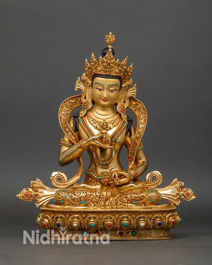 Front view of handcrafted Vajrasattva statue from Nepal with fire-gilded gold copper finish