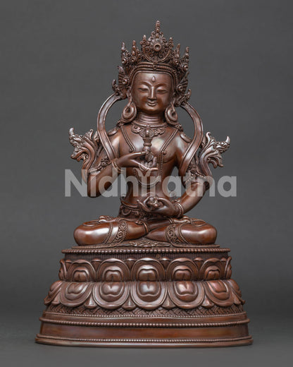 Front view of handcrafted Vajrasattva statue in oxidized copper from Patan Nepal
