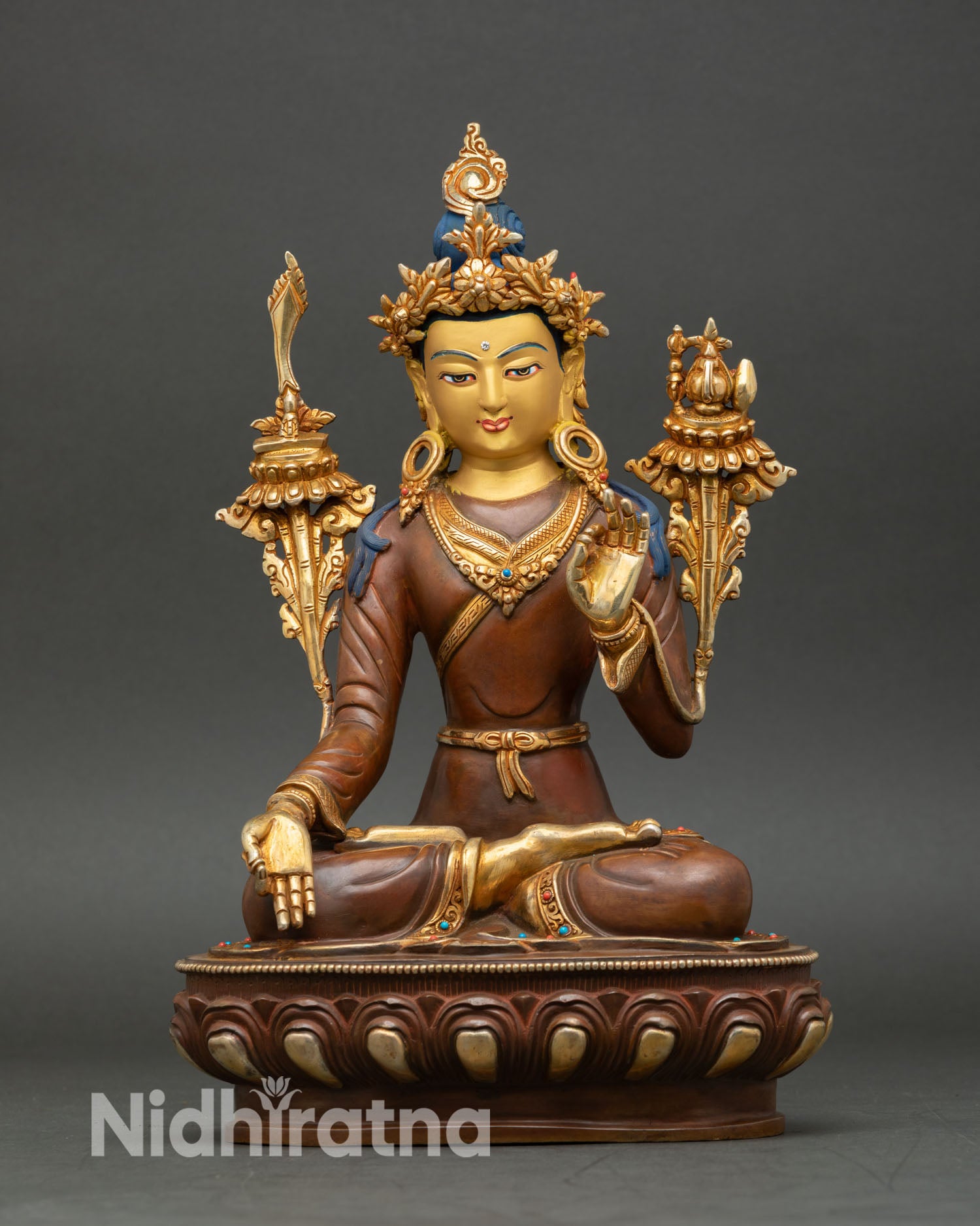Front view of handcrafted Yuthok Yonten Gonpo statue from Nepal in oxidized copper with gold gilded details sacred Tibetan medicine master sculpture