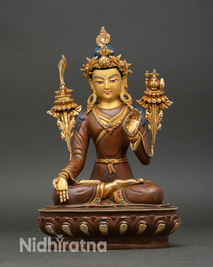 Front view of handcrafted Yuthok Yonten Gonpo statue from Nepal in oxidized copper with gold gilded details sacred Tibetan medicine master sculpture