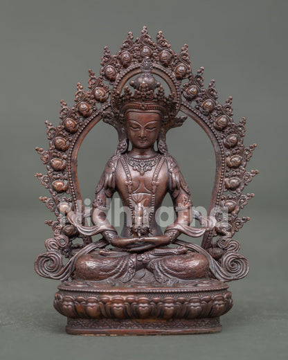 Front view of Handmade Amitayus Statue with oxidized copper finish on lotus pedestal