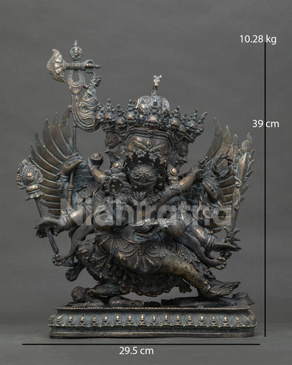 Front view of handmade bronze three-faced Hayagriva statue from Nepal with outspread wings