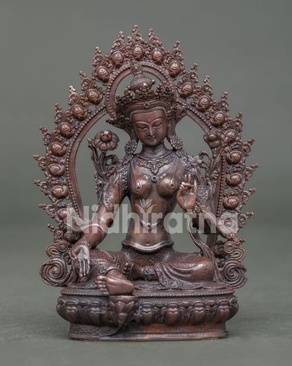 Front view of Handmade Green Tara Statue with oxidized copper finish and floral halo