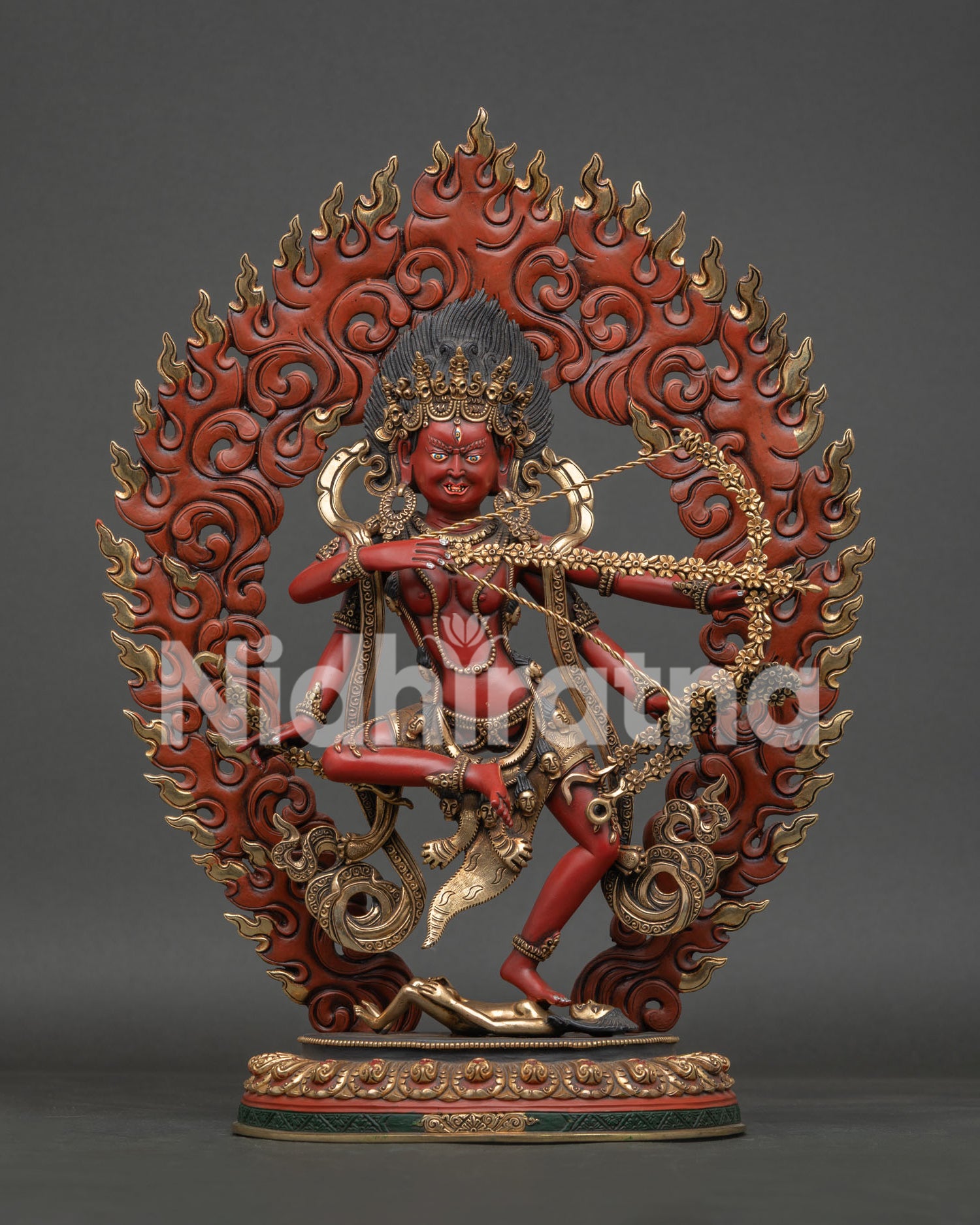 Front view of Handmade Kurukulla Statue with gold-gilded details and flaming halo