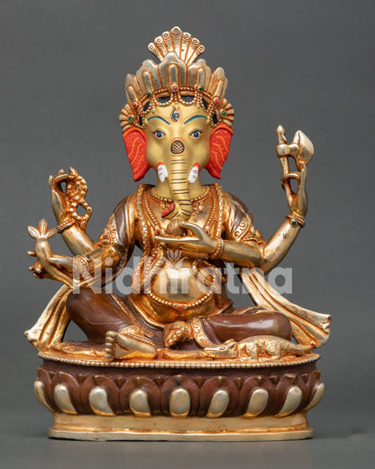 Front view of a handmade Lord Ganesh statue crafted in copper with 24K gold gilding and oxidized finish from Nepal