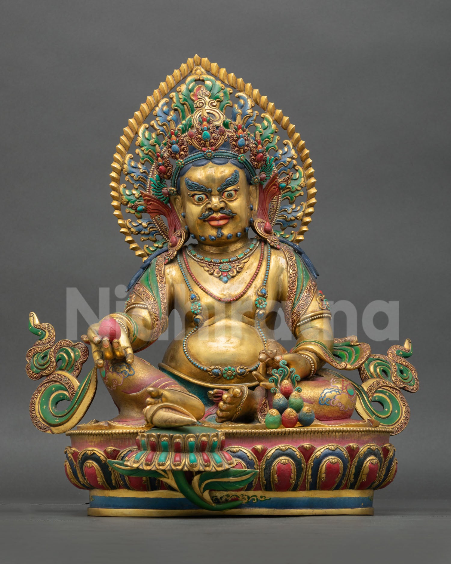 Front view of handmade Tibetan Yellow Dzambhala statue with gold gilded antique finish
