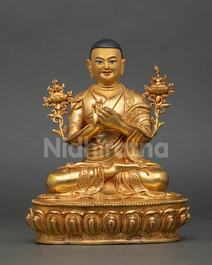 Front view of Je Tsongkhapa statue handmade in copper with 24K gold fire gilded finish and gold painted face from Nepal
