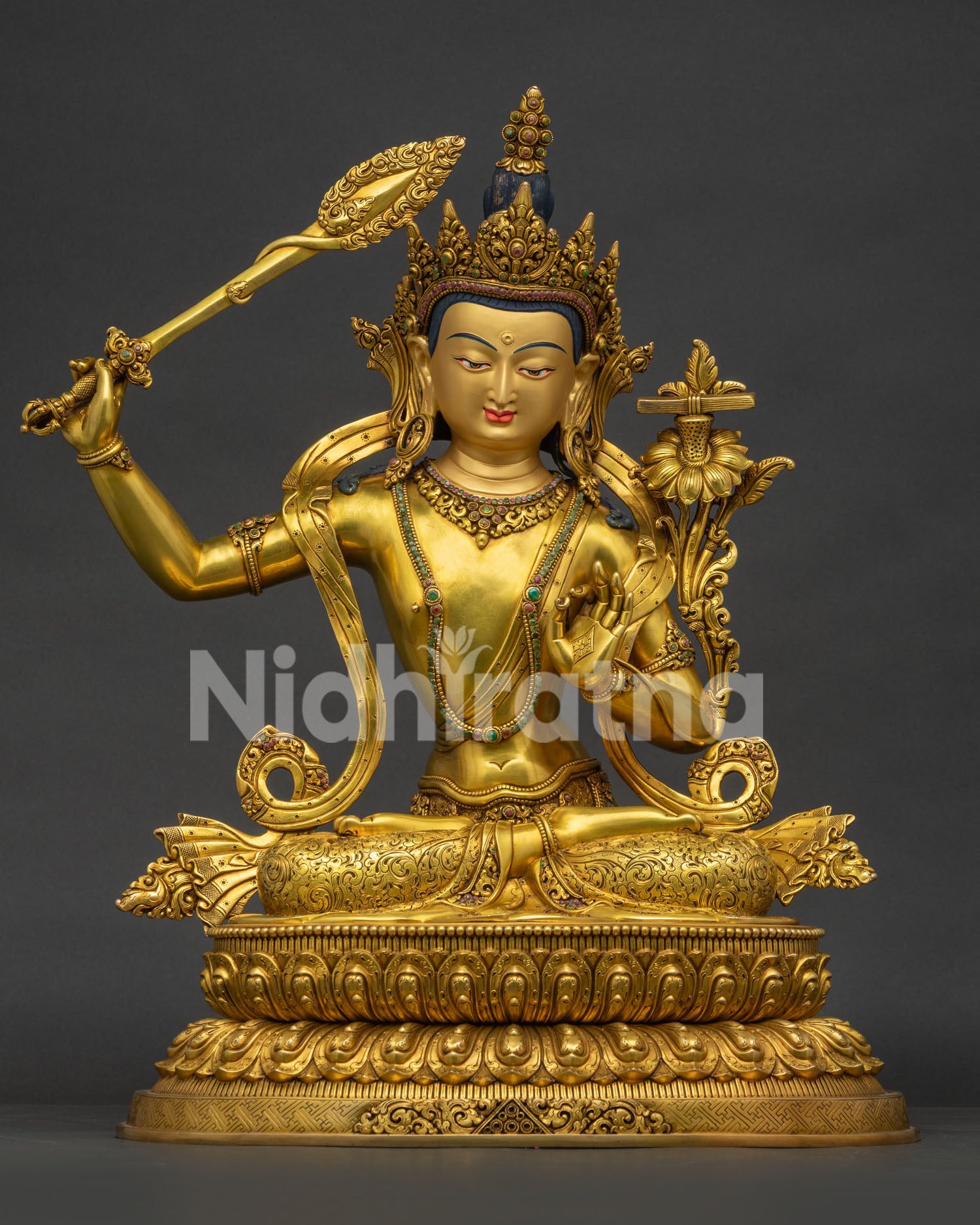 Front view of large gold-gilded Manjushri statue handcrafted in Nepal