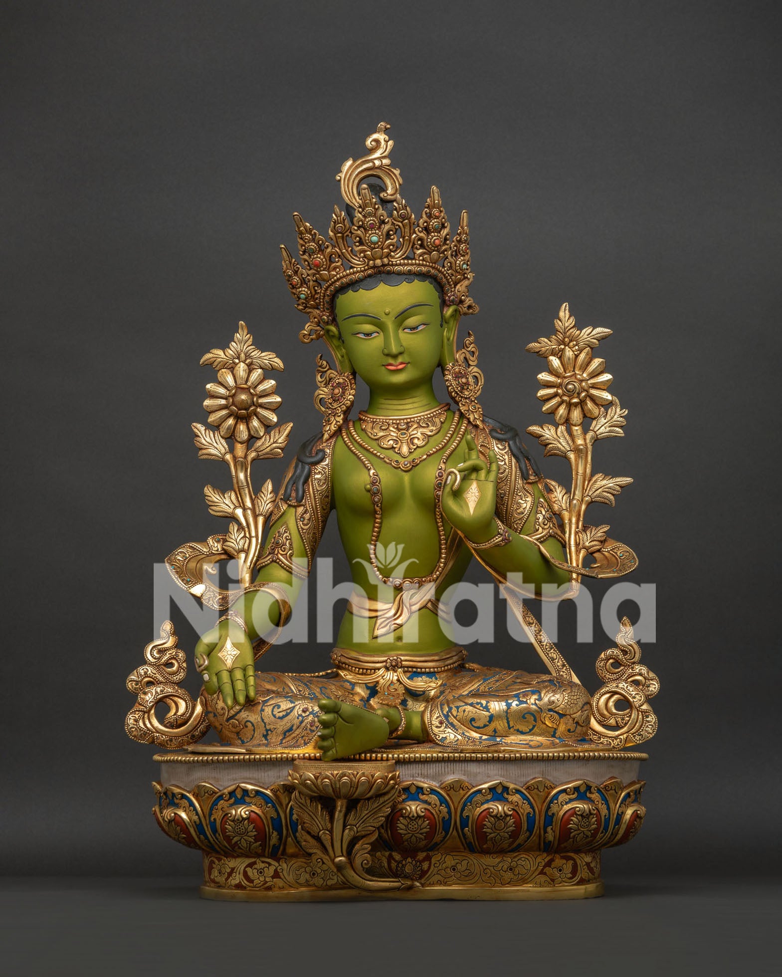 Front view of large Green Tara statue in gold gilded solid copper with ornate lotus pedestal