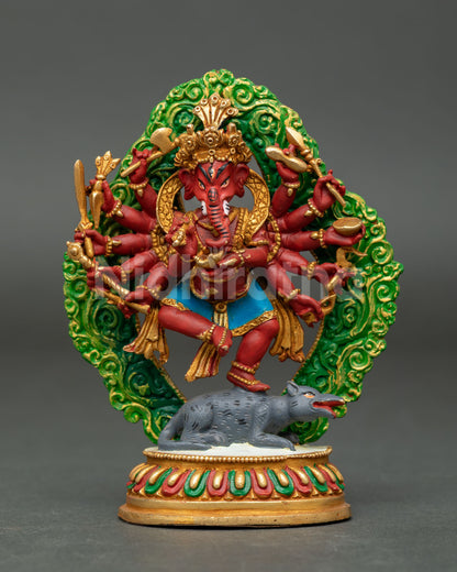 Front view of Lord Ganesh statue handcrafted in copper with acrylic colors gold detailing and lotus pedestal symbolizing wisdom and success.