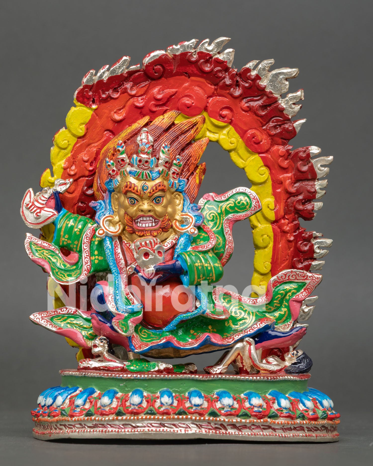 front view of mahakala bernagchen statue with vibrant acrylic colors and gold face