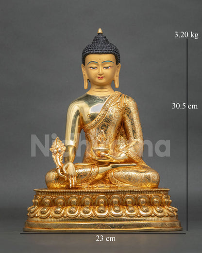 Front view of Medicine Buddha Statue handcrafted in Patan, Nepal with 24K gold fire-gilding, gold-painted face, and lotus pedestal.