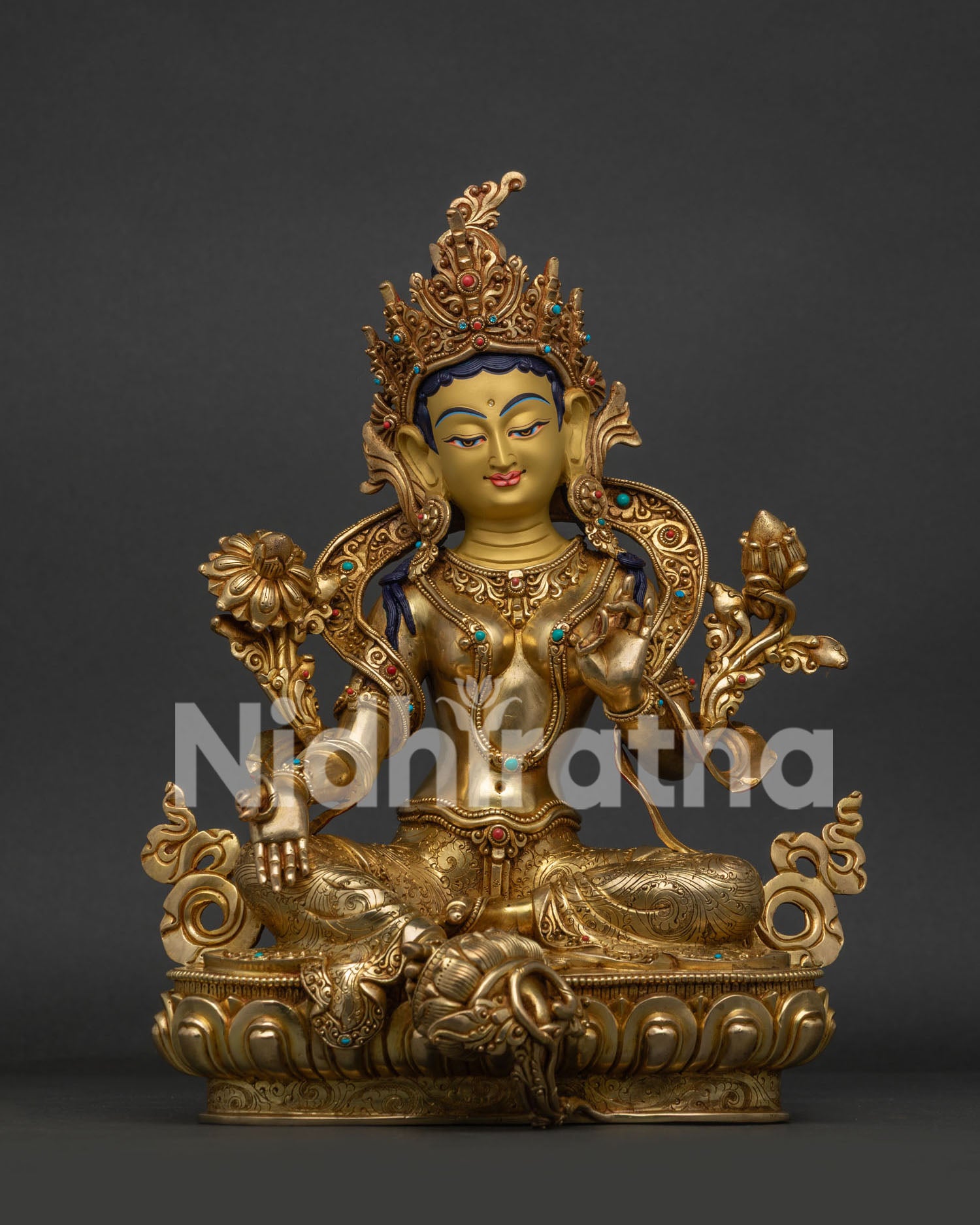 Front view of Mother Green Tara statue with three layers of 24K gold gilding and lotus pedestal