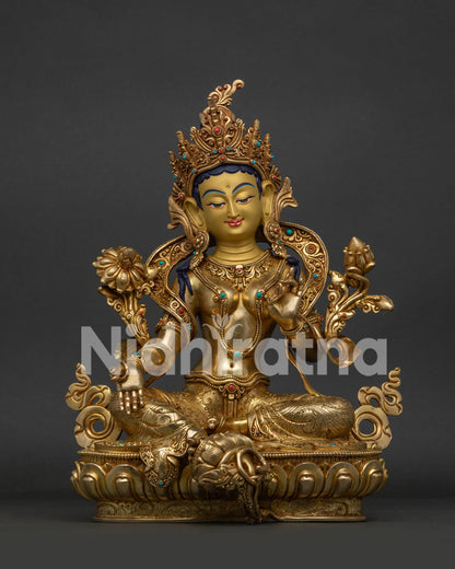 Front view of Mother Green Tara statue with three layers of 24K gold gilding and lotus pedestal