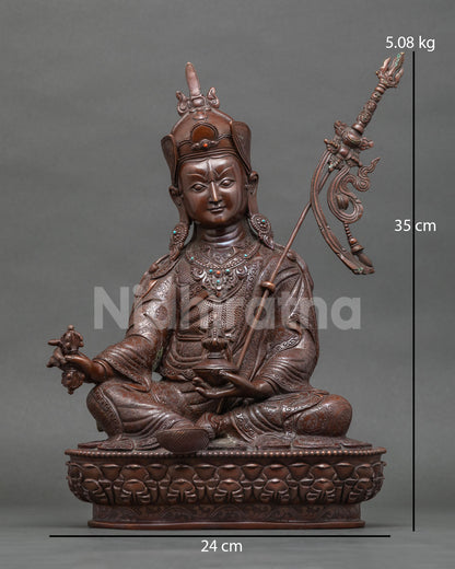 Front view of oxidized copper Guru Rinpoche statue, handcrafted Padmasambhava sculpture from Nepal
