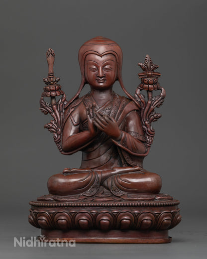 Front view of oxidized copper Tsongkhapa statue with intricate details handcrafted by Nepalese artisans