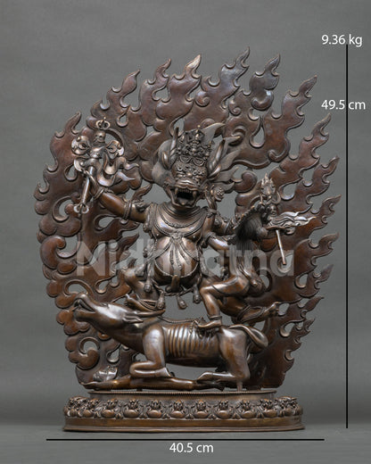 Front view of oxidized copper Yamantaka and Vajravetali Yab Yum statue on a buffalo with flaming halo