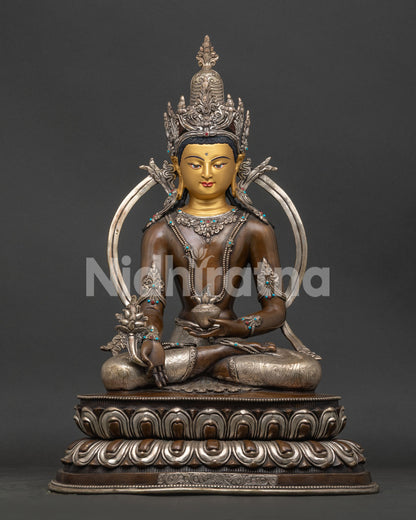 Front view of Oxidized Medicine Buddha Statue with silver plating and turquoise stone inlay