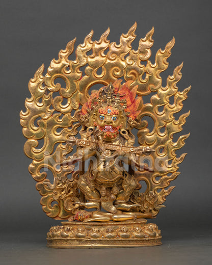Front view of Sakya Mahakala statue handmade in copper with gold gilding and gold painted face from Nepal