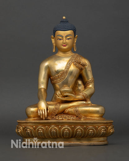 Front view of Shakyamuni Buddha statue copper 24K gold gilded Bhumisparsha Mudra Nepal