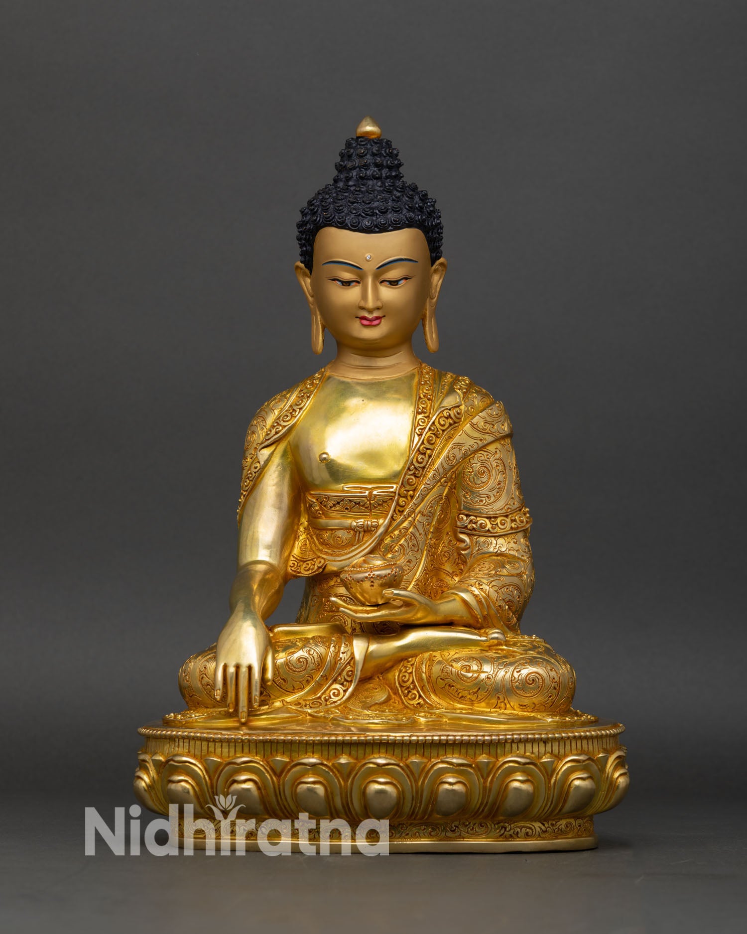 Front view of Shakyamuni Buddha statue, copper and gold fire-gilded on lotus pedestal