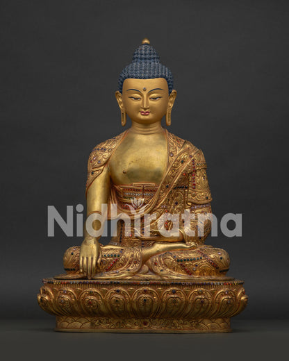 Shakyamuni Buddha Statue handcrafted in Nepal with 24K gold gilding and gemstone inlays front view
