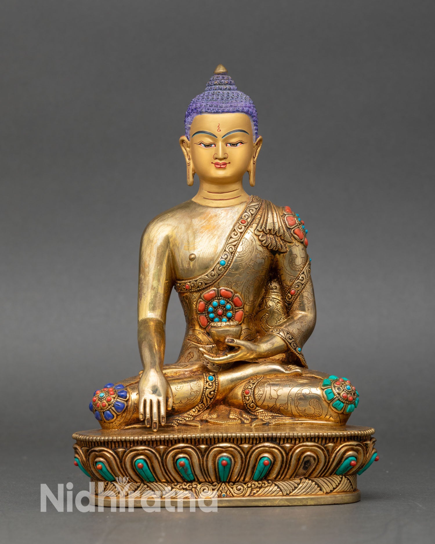 Front view of Shakyamuni Buddha statue handcrafted in Nepal with gold fire gilded copper
