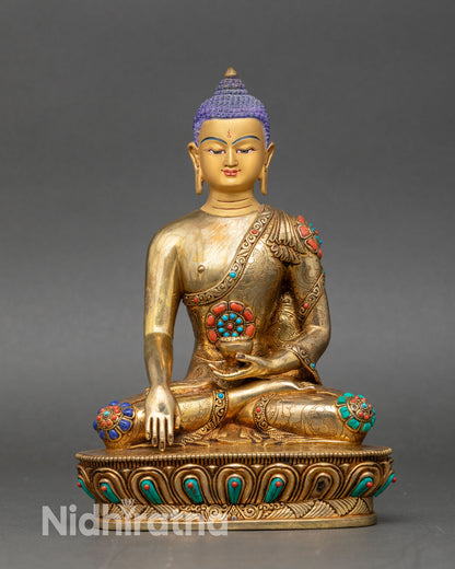 Front view of Shakyamuni Buddha statue handcrafted in Nepal with gold fire gilded copper