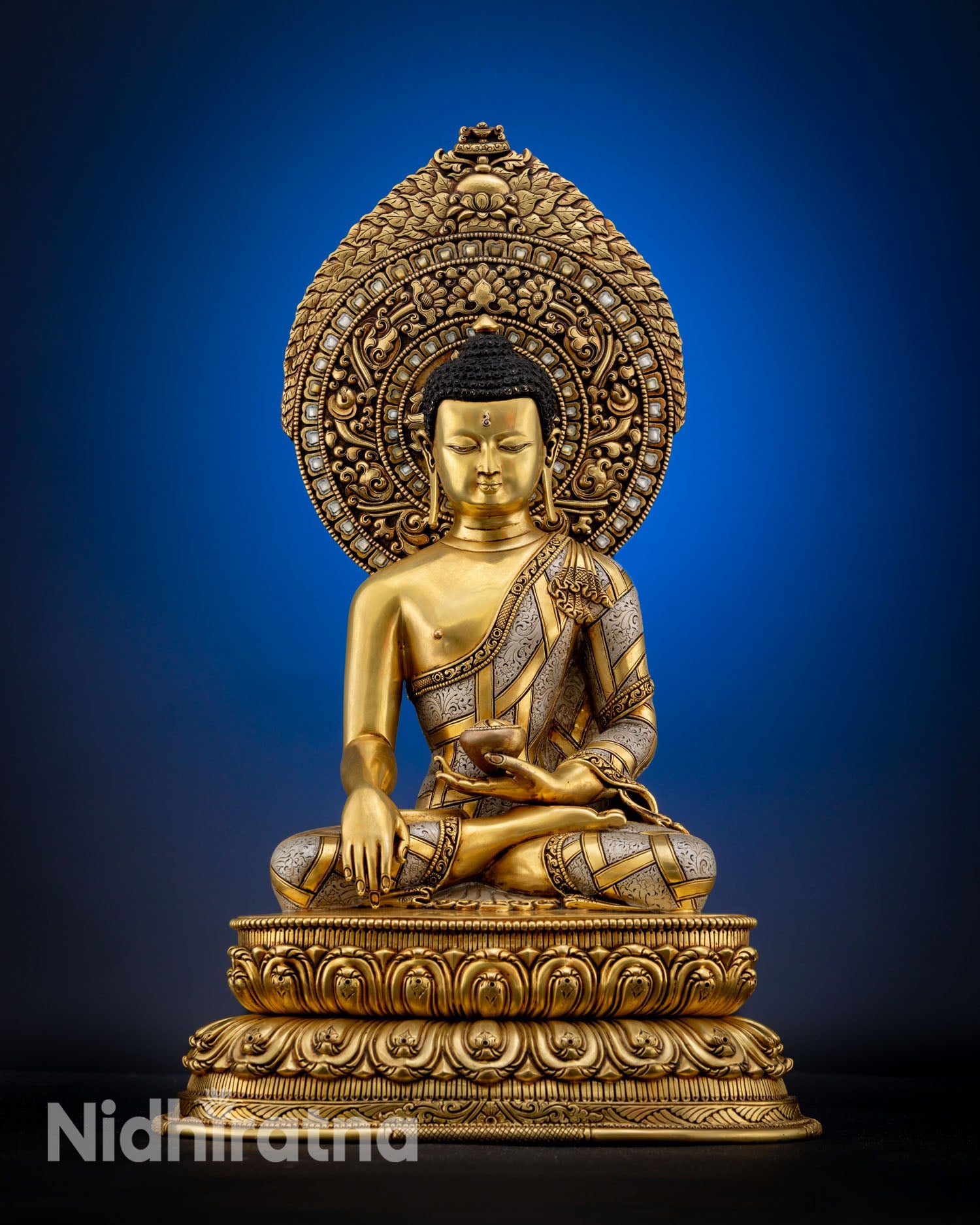 Front view of Shakyamuni Buddha statue museum-quality copper sculpture with 24K gold fire gilding and semi-precious stone halo for spiritual home decor