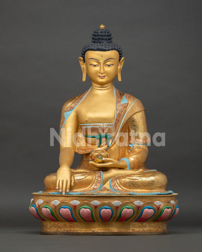Front view of Shakyamuni Buddha statue, seated on lotus pedestal with earth touching mudra