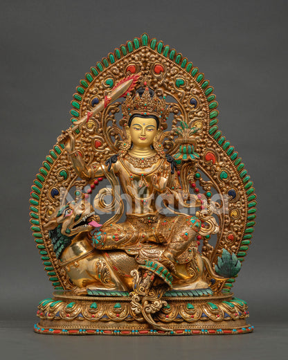 Front view of Simhanada Manjushri statue, handcrafted in Nepal with gold fire gilding and snow lion lotus seat