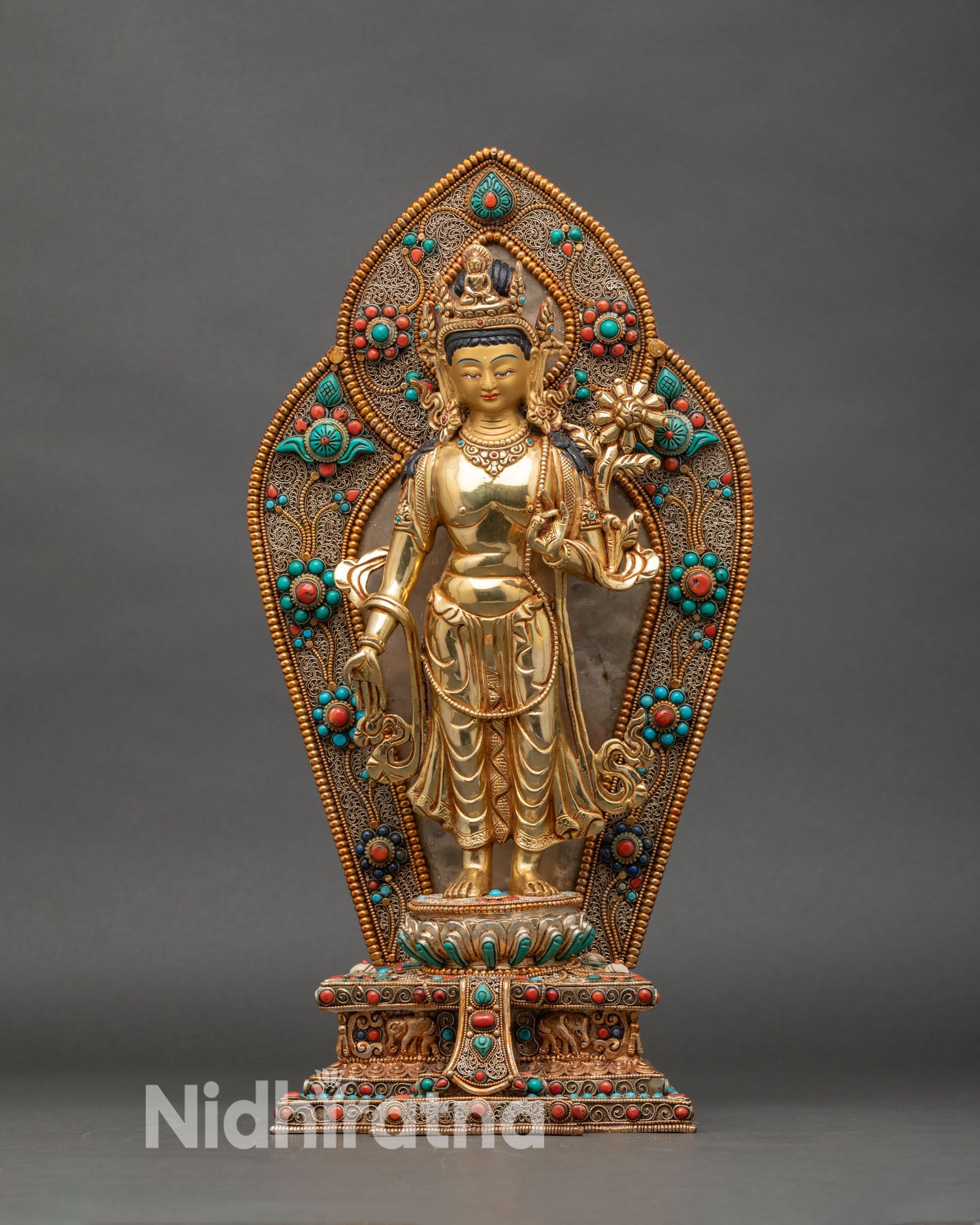 Front view of Standing Chenrezig statue, gold fire-gilded copper with lotus and halo
