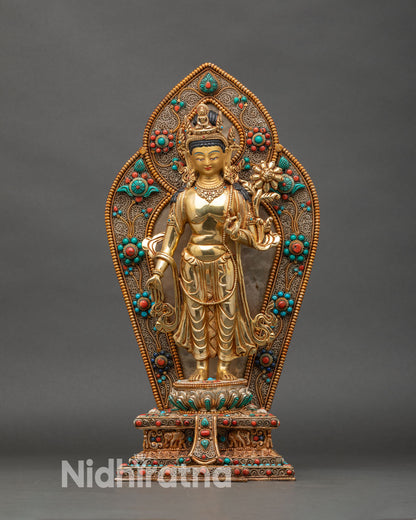 Front view of Standing Chenrezig statue, gold fire-gilded copper with lotus and halo
