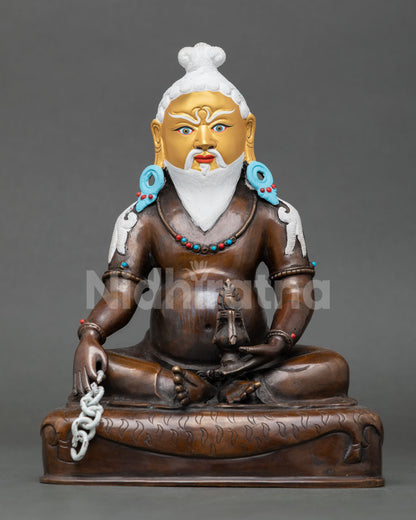Front view of Thangtong Gyalpo oxidized copper Buddhist statue with gold-painted face