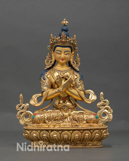 Front view of Vajradhara statue handcrafted in Nepal in 24K gold gilded copper with semi precious stone inlays