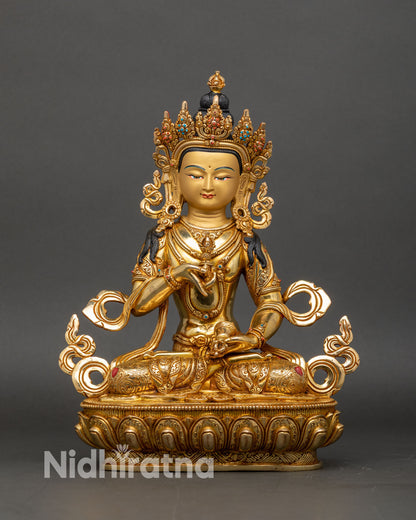 Front view of Vajrasattva statue handcrafted in Nepal with fire-gilded gold copper finish